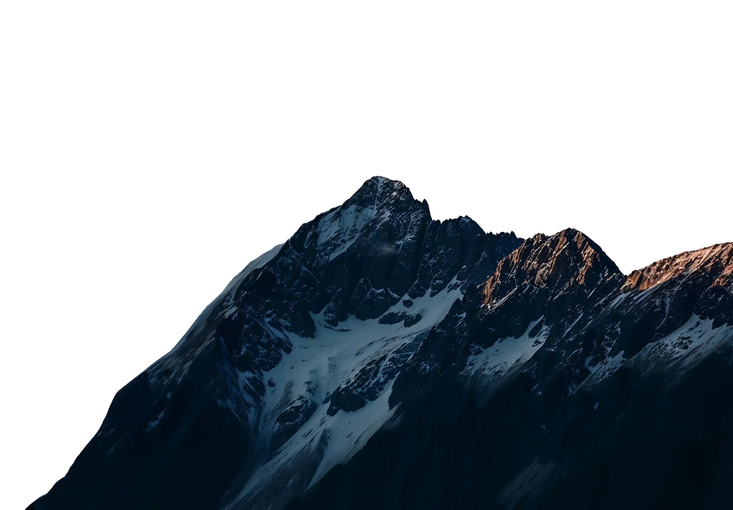 Snow-capped mountain peak at dusk with dramatic lighting against a black sky.